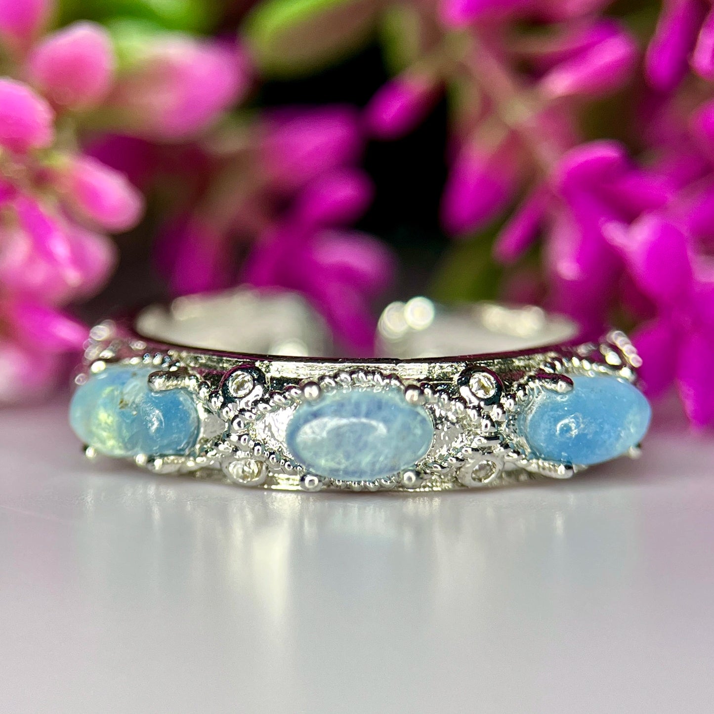 Ring met natuurlijke aquamarijn, CZ en rhodiumplating